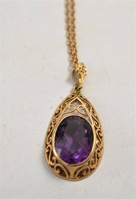 Lot 213 - A 9ct gold amethyst pendant on chain