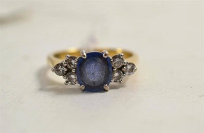 Lot 215 - A sapphire and diamond ring