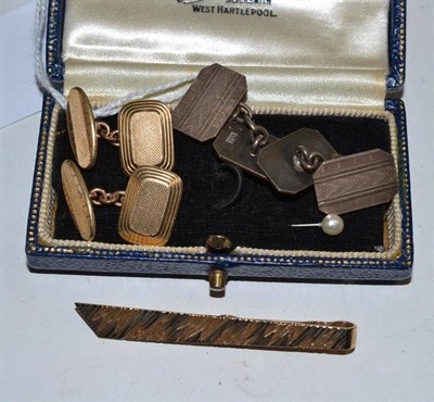 Lot 216 - A 9ct gold tie slide, a pair of rolled gold cufflinks and a pair of silver cufflinks