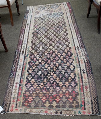 Lot 1100 - Senneh Kilim, the charcoal lattice field of...