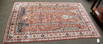 Lot 1237 - Indian Prayer Rug, the terracotta field...