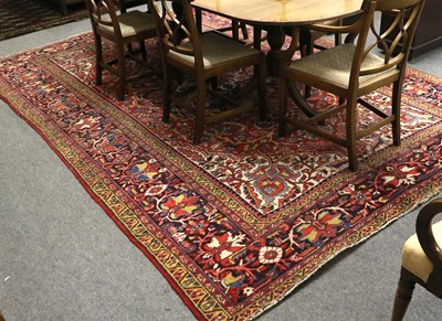 Lot 1158 - Ahar Heriz Carpet, the blood red field centred...