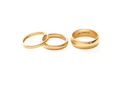 Lot 365 - Two 18 Carat Gold Band Rings, finger sizes...