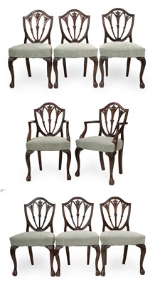 Lot 696 - A Set of Eight (6+2) Caved Mahogany...