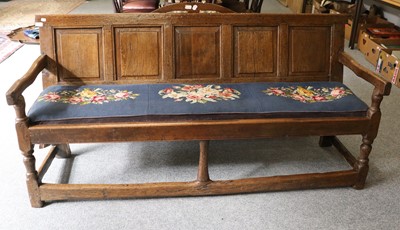 Lot 1194 - An 18th Oak Five Panneled Settle, with...