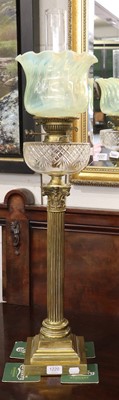 Lot 1220 - A Victorian Oil Lamp, with wrythen vaseline...