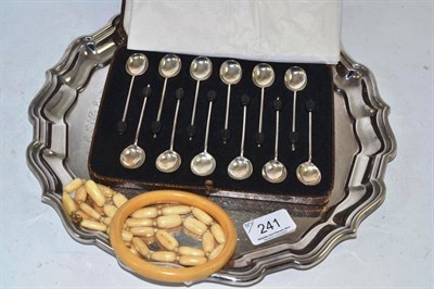 Lot 241 - A set of twelve silver coffee bean spoons, silver plated tray, coaster, ivory beads, two...