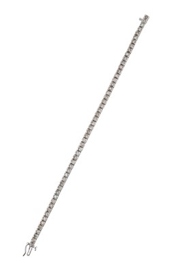 Lot 2280 - A Diamond Line Bracelet the fifty-four round...