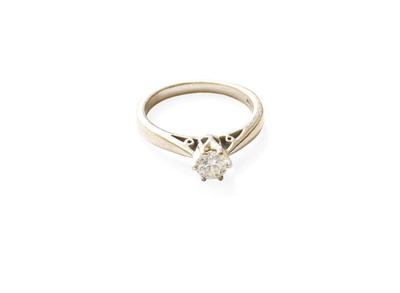 Lot 472 - A Platinium Diamond Solitaire Ring, the round...