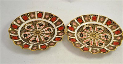 Lot 247 - A pair of Royal Crown Derby plates with fluted rim