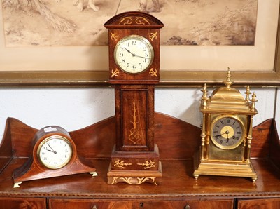 Lot 1284 - A French Brass Striking Mantel Clock, retailed...