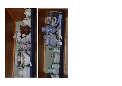Lot 250 - Two shelves of assorted 19th century and later decorative pottery, pair of Adams blue and white...