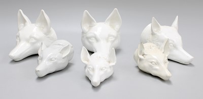 Lot 223 - Five Porcelain White Glazed Fox Mask Stirrup...