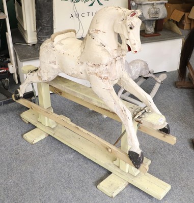 Lot 1098 - A Painted Rocking Horse, on trestle base (a/f)...