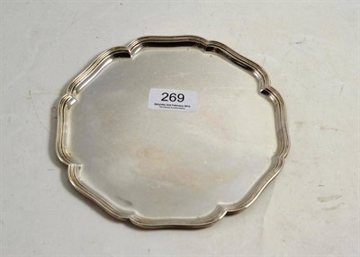 Lot 269 - A Dutch white metal circular salver with bracketed edge, 18cm diameter