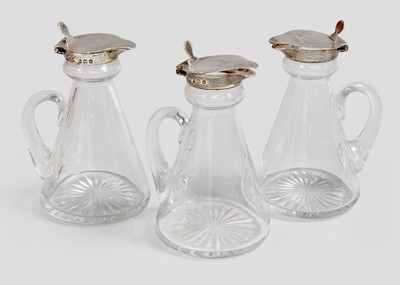 Lot 25 - A Set of Three George V Silver-Mounted Glass...