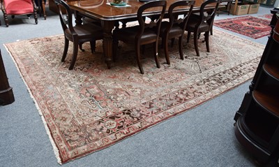 Lot 1118 - Heriz Carpet, the soft brick red field of...