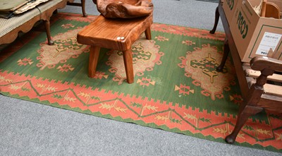 Lot 1115 - Turkish Kilim, the green field with three...