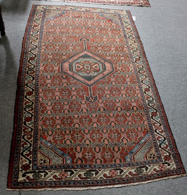 Lot 1109 - Hamadan Rug, the madder field with columns of...