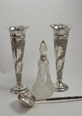 Lot 297 - A pair of silver loaded spill vases, a glass silver collar bottle and a silver ladle