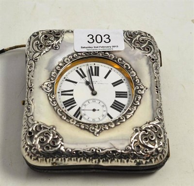 Lot 303 - A silver mounted travelling case containing a nickel plated watch