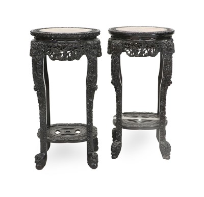 Lot 827 - A Pair of Chinese Carved Hardwood Plant Stands,...