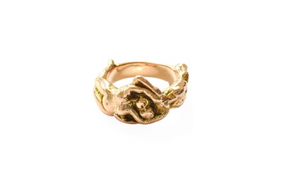 Lot 399 - A 9 Carat Gold Ring, depicting intertwined...