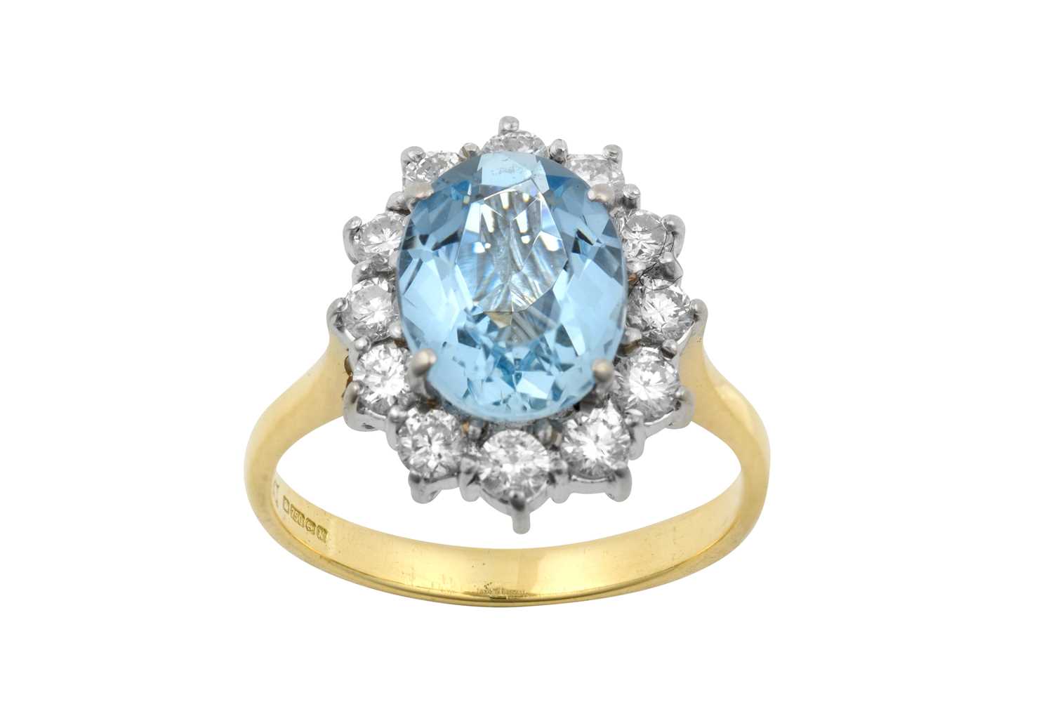 Lot 2286 - An 18 Carat Gold Aquamarine and Diamond
