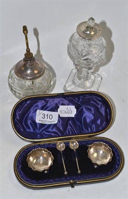 Lot 310 - A pair of silver salts and spoons in a fitted case, silver mounted cut glass scent bottle and a cut