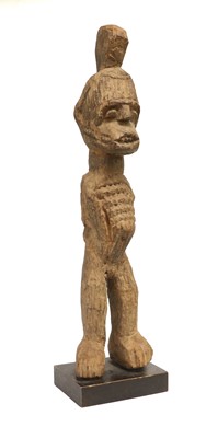 Lot 350 - An Igbo Carved Wood Figure, Nigeria, standing,...