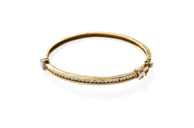 Lot 451 - A Diamond Bangle, the round brilliant cut...