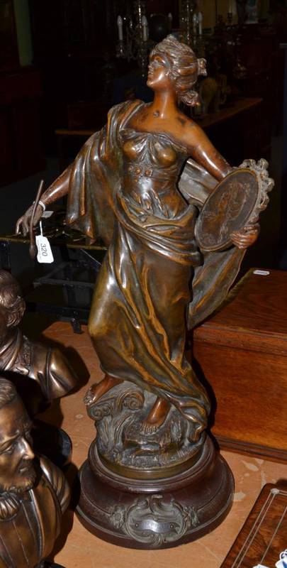 Lot 320 - Spelter figure of a maiden with paint brush