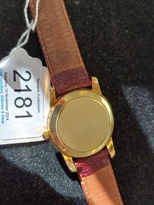 Lot 2181 - Omega: An 18 Carat Gold Automatic Calendar...