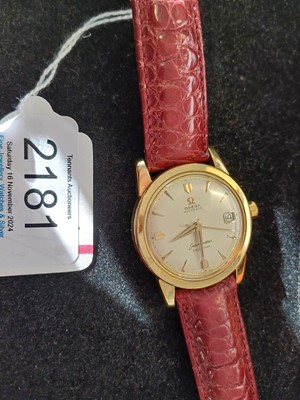 Lot 2181 - Omega: An 18 Carat Gold Automatic Calendar...