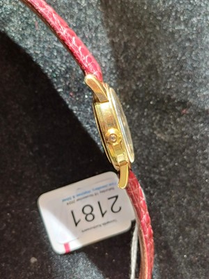 Lot 2181 - Omega: An 18 Carat Gold Automatic Calendar...