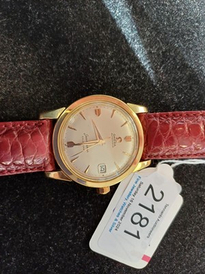 Lot 2181 - Omega: An 18 Carat Gold Automatic Calendar...