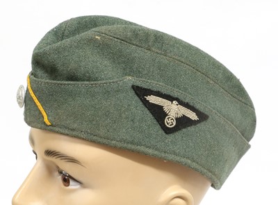 Lot 235 - A German Waffen SS M1934 Cavalry Forage Cap,...