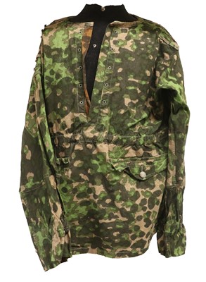 Lot 243 - A German Waffen SS Reversible Camouflage Smock,...