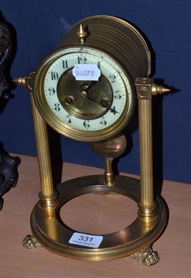 Lot 331 - A brass two train clock with French movement