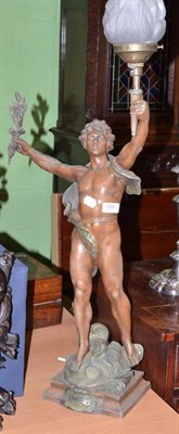 Lot 334 - A spelter figural lamp with glass torch shade