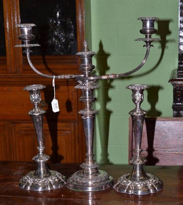 Lot 335 - A pair of plated candlesticks and a plated candelabrum