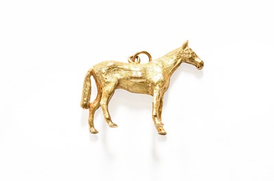 Lot 478 - A 9 Carat Gold Pendant, modelled as a horse in...