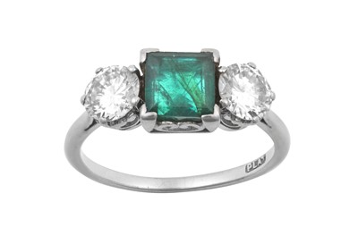 Lot 2295 - An Emerald and Diamond Three Stone Ring the...