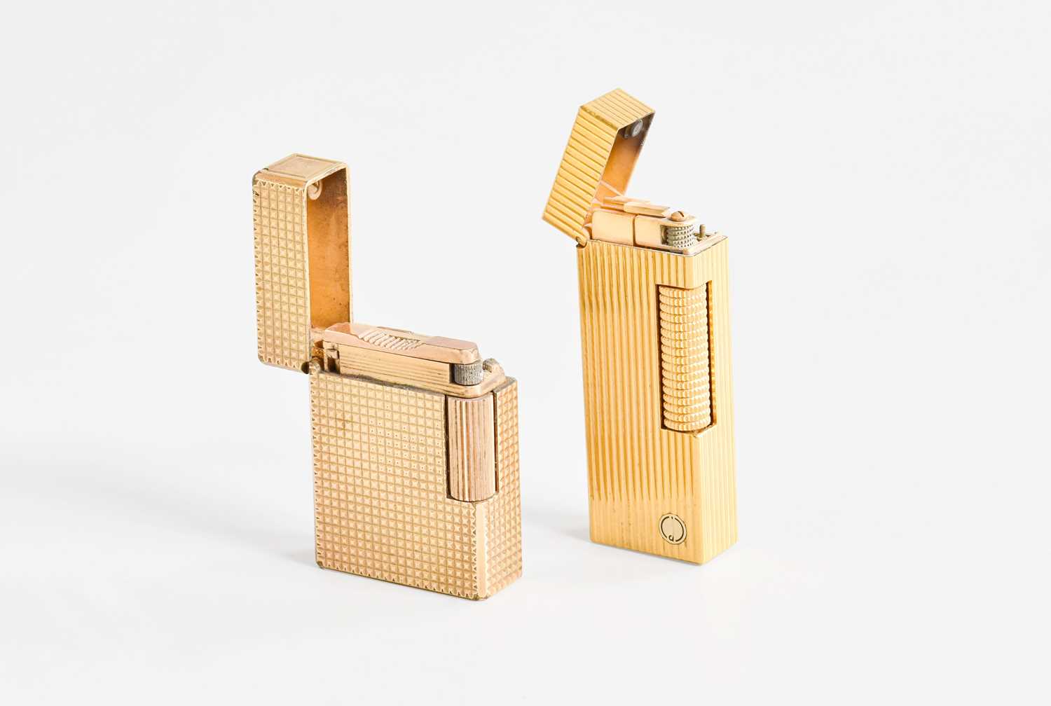 Lot 87 - A Dunhill Gilt Metal Roller Gas Lighter,...