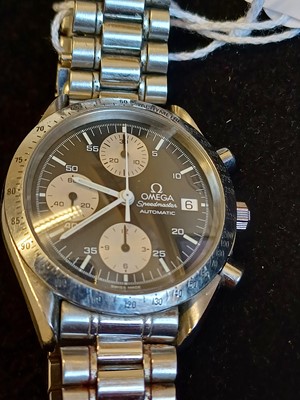 Lot 2123 - Omega: A Stainless Steel Automatic Calendar...