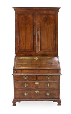 Lot 720 - A George II Walnut Desk-and-Bookcase, circa...