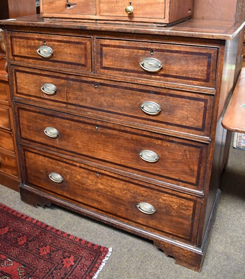 Lot 1360 - A George III Cross-Banded Oak Chest of Drawers,...