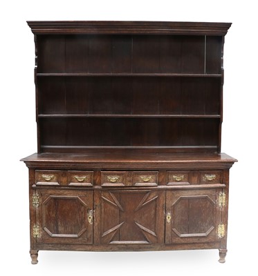 Lot 692 - An Early 18th Century Oak Enclosed Dresser and...