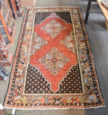 Lot 1166 - Kayseri Rug, the chestnut field with two...