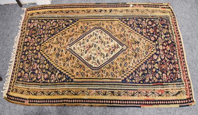 Lot 1138 - Senneh Kilim, the indigo field of stylised...